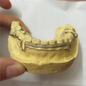 Hawley retainer with lip bumper – case by Well Dental Lab